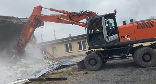 Usługi koparka kołową Hitachi ZAXIS 210 W